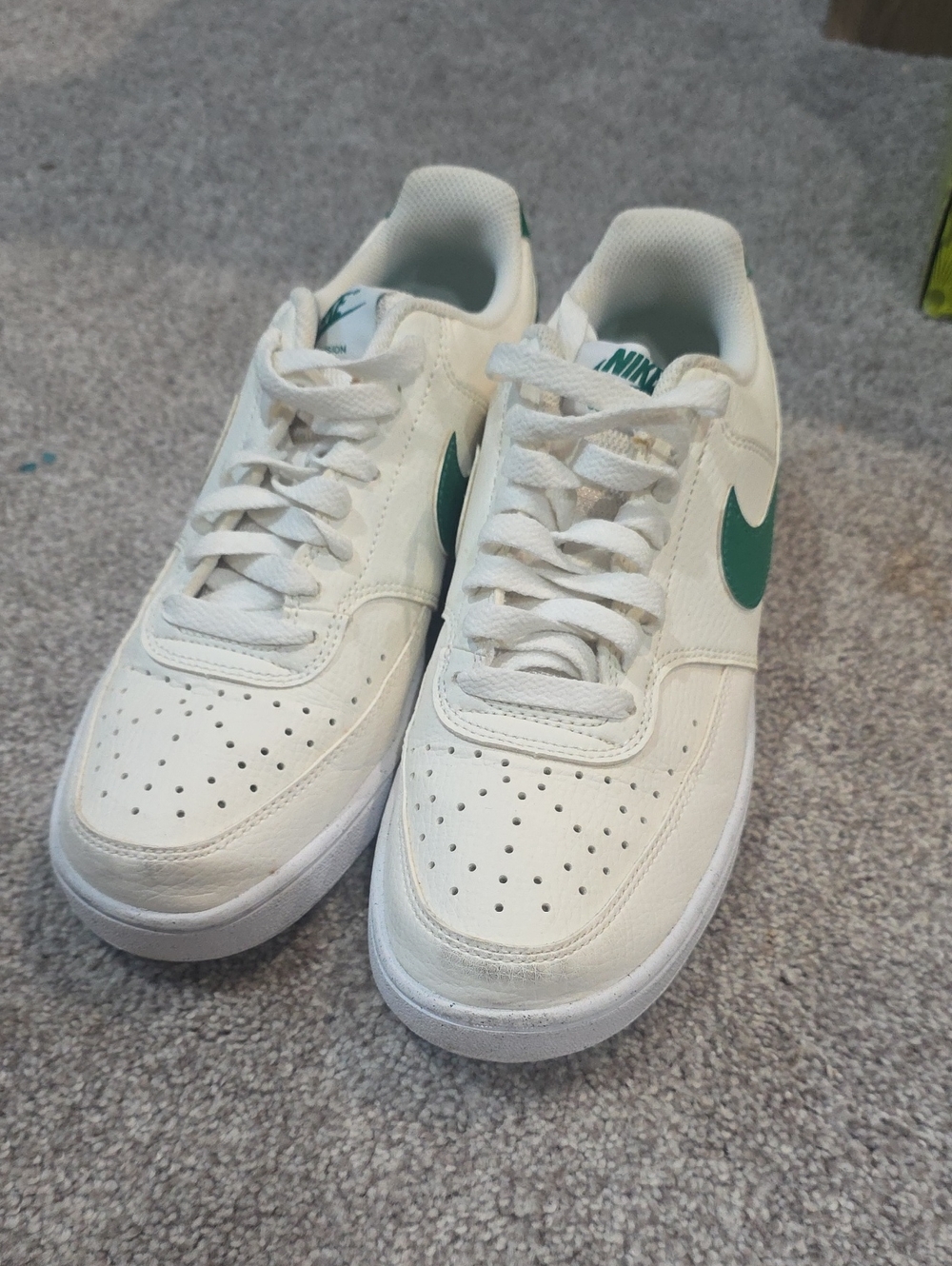 Nike White Low-Top Sneakers with Green Swoosh